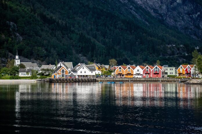 Stunning view of the Fjords of Norway with clear blue waters and mountains